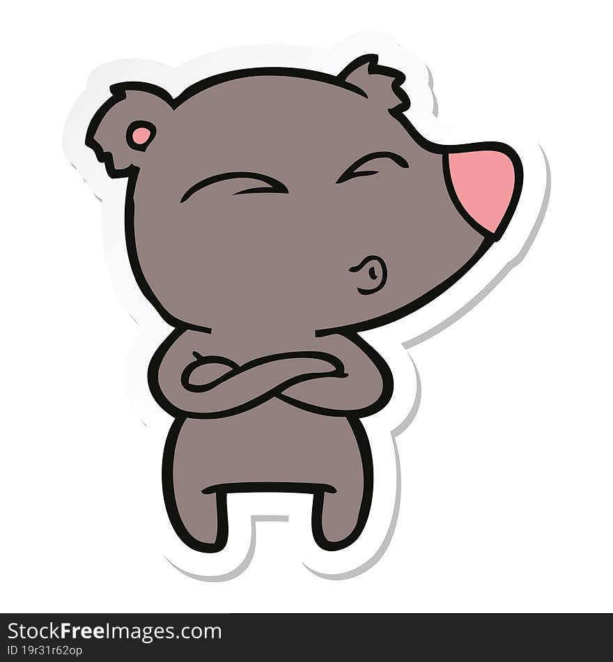 sticker of a cartoon whistling bear