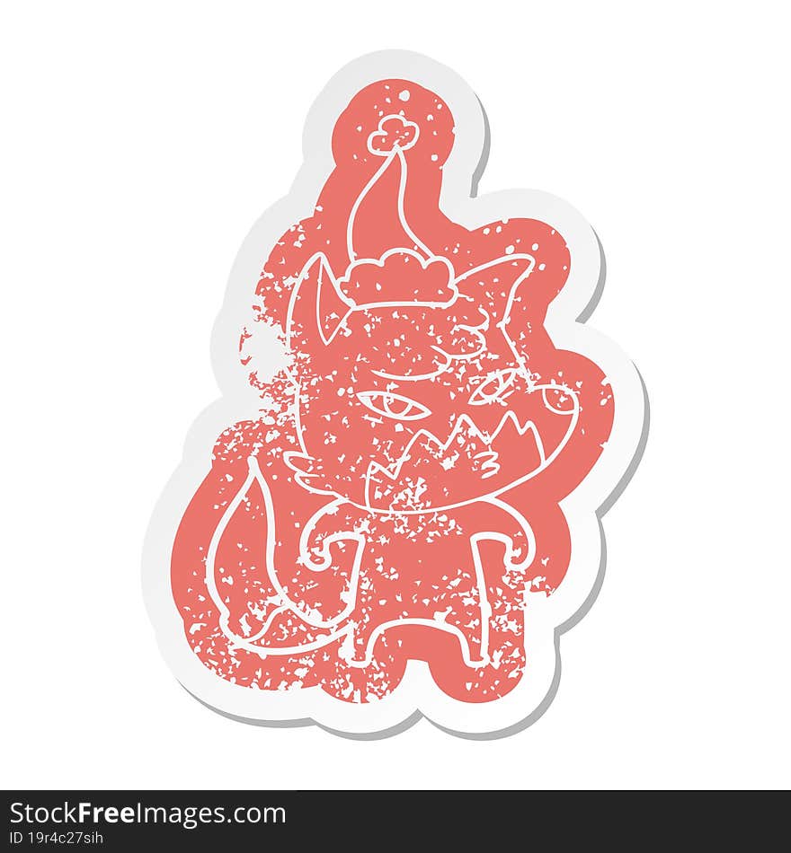 Clever Cartoon Distressed Sticker Of A Fox Wearing Santa Hat