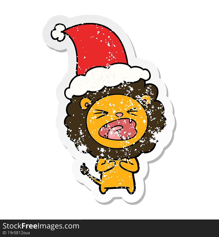 distressed sticker cartoon of a lion wearing santa hat