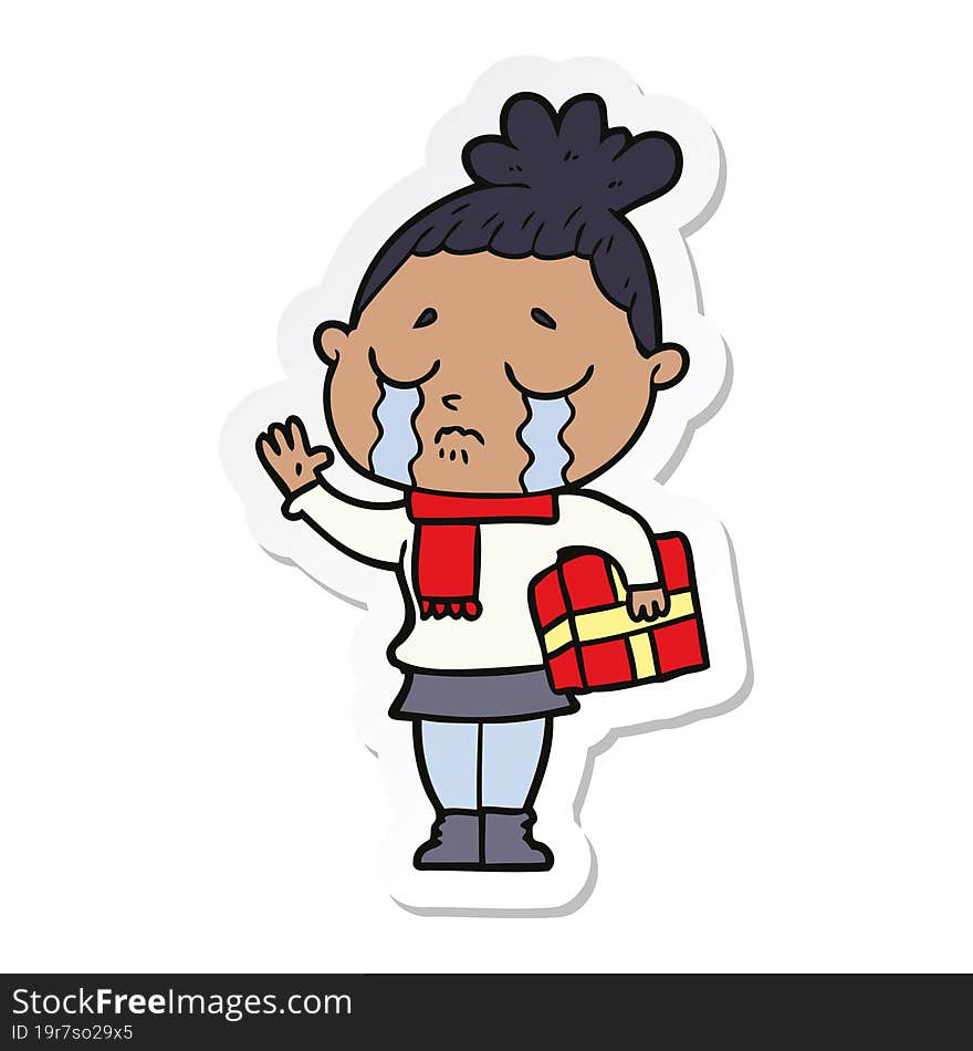 sticker of a cartoon crying woman with christmas gift