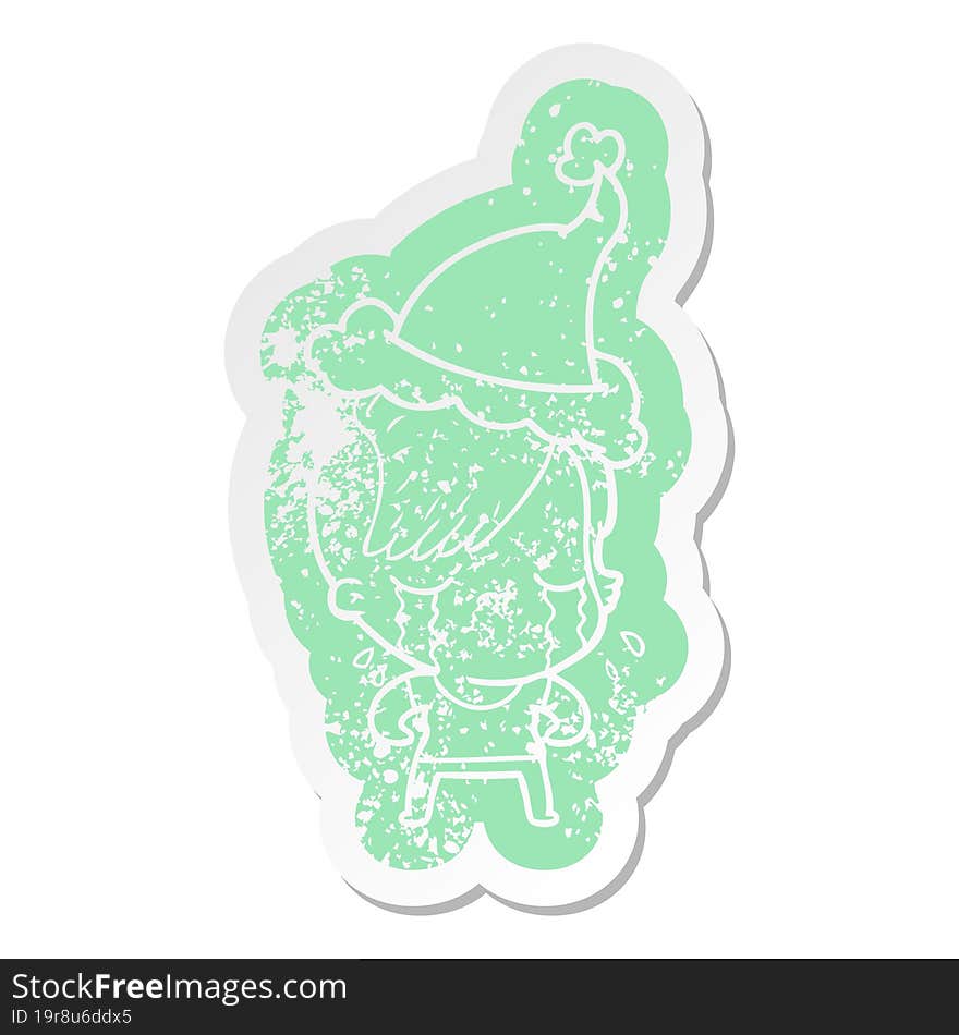 cartoon distressed sticker of a crying girl wearing santa hat