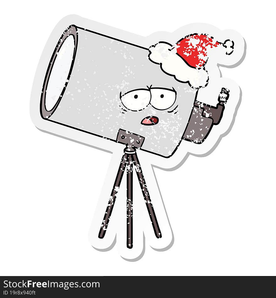 distressed sticker cartoon of a bored telescope with face wearing santa hat