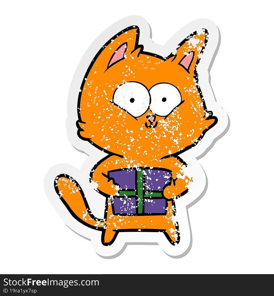 distressed sticker of a cartoon cat holding christmas present