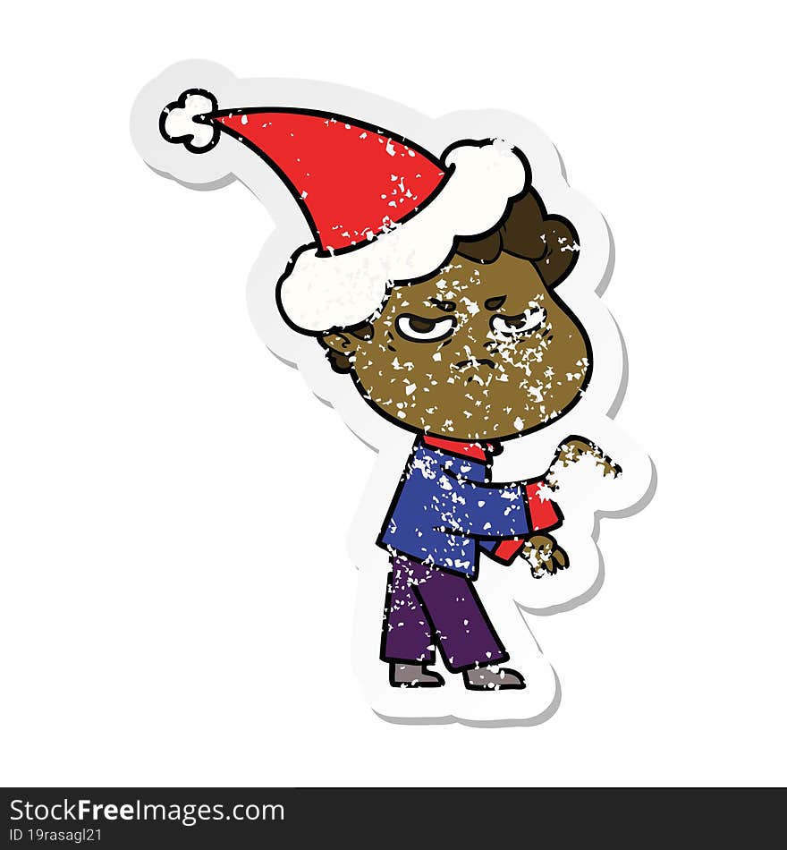 Distressed Sticker Cartoon Of A Angry Man Wearing Santa Hat