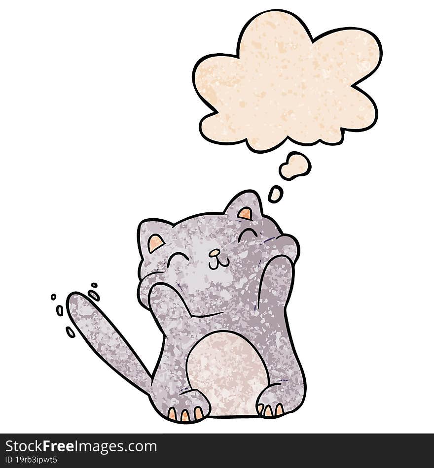 cartoon cat with thought bubble in grunge texture style. cartoon cat with thought bubble in grunge texture style