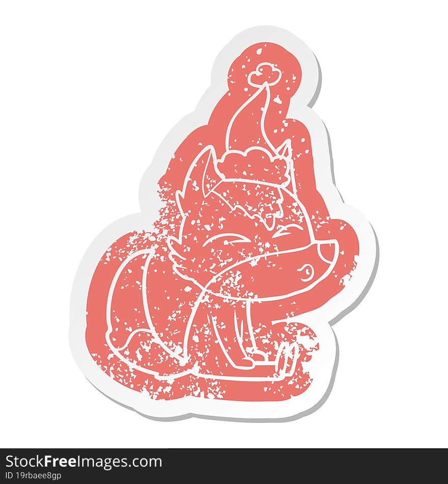 cartoon distressed sticker of a wolf whistling wearing santa hat