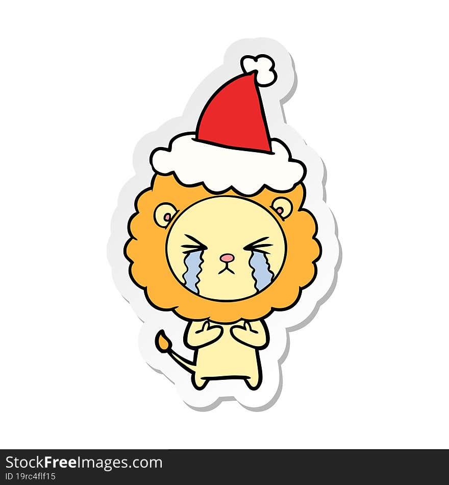 sticker cartoon of a crying lion wearing santa hat