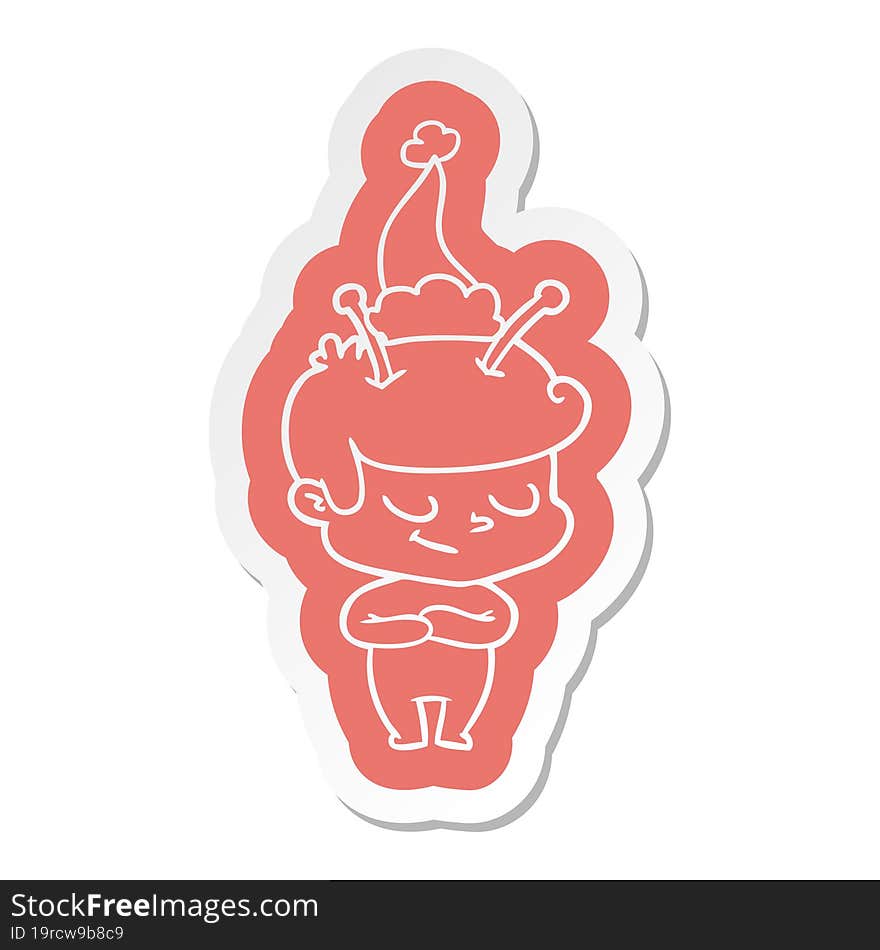 friendly cartoon  sticker of a spaceman wearing santa hat