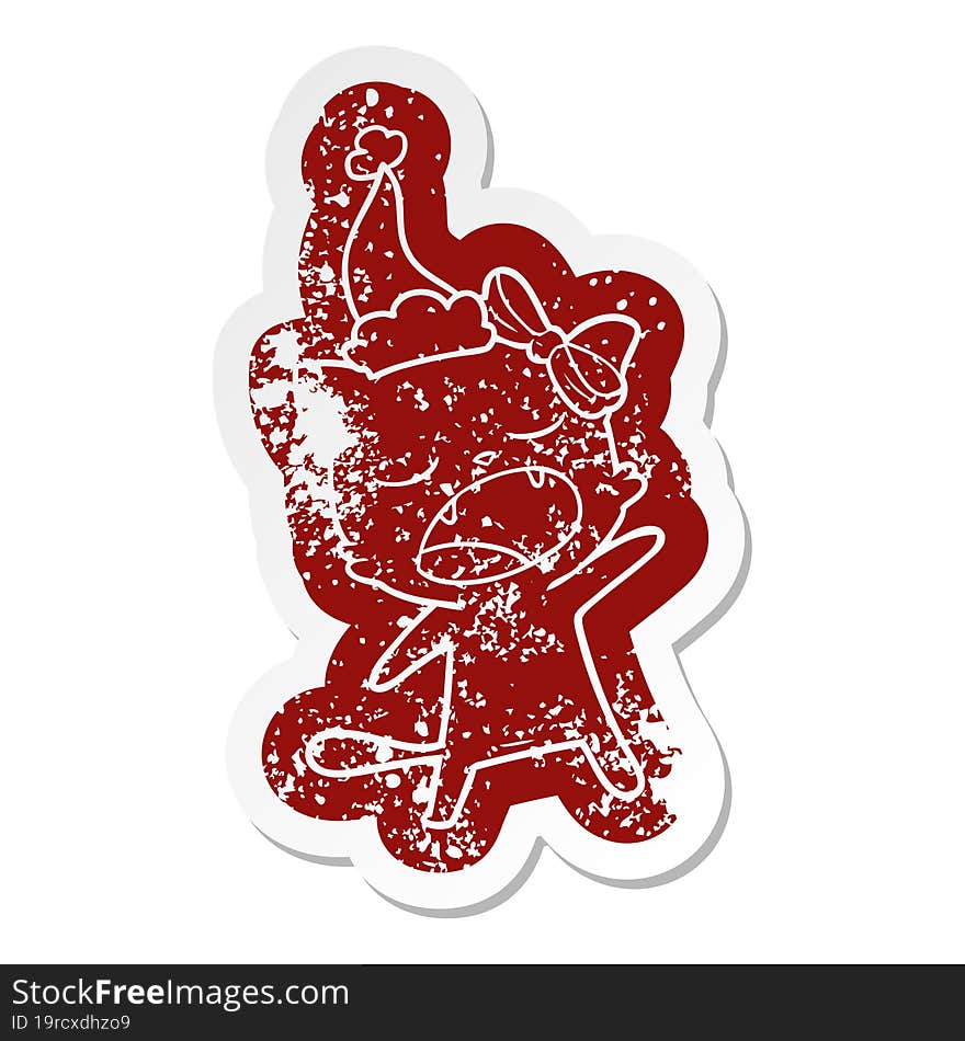 Cartoon Distressed Sticker Of A Singing Cat Wearing Santa Hat