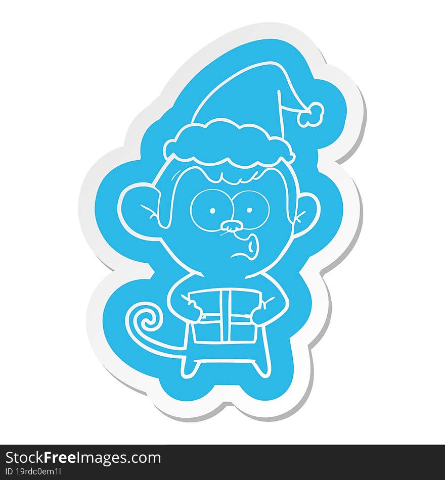 cartoon  sticker of a christmas monkey wearing santa hat