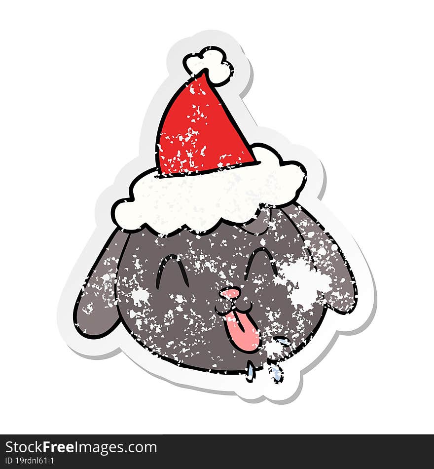 distressed sticker cartoon of a dog face wearing santa hat