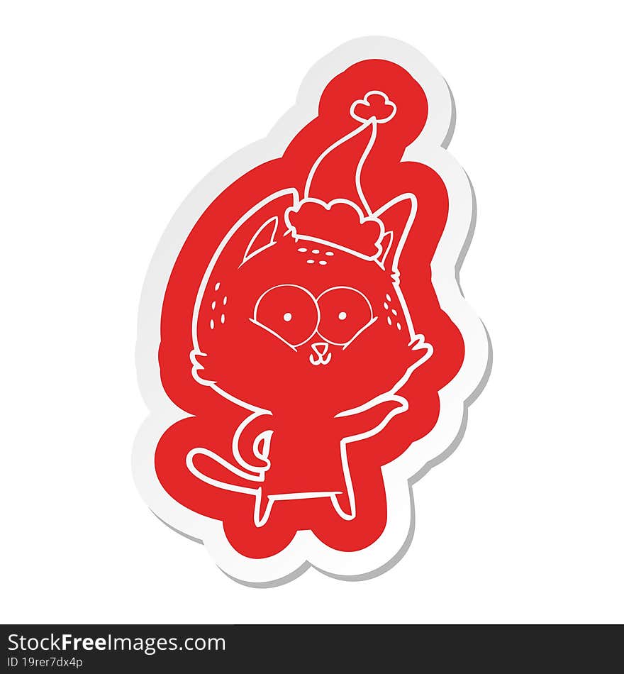 quirky cartoon  sticker of a cat wearing santa hat