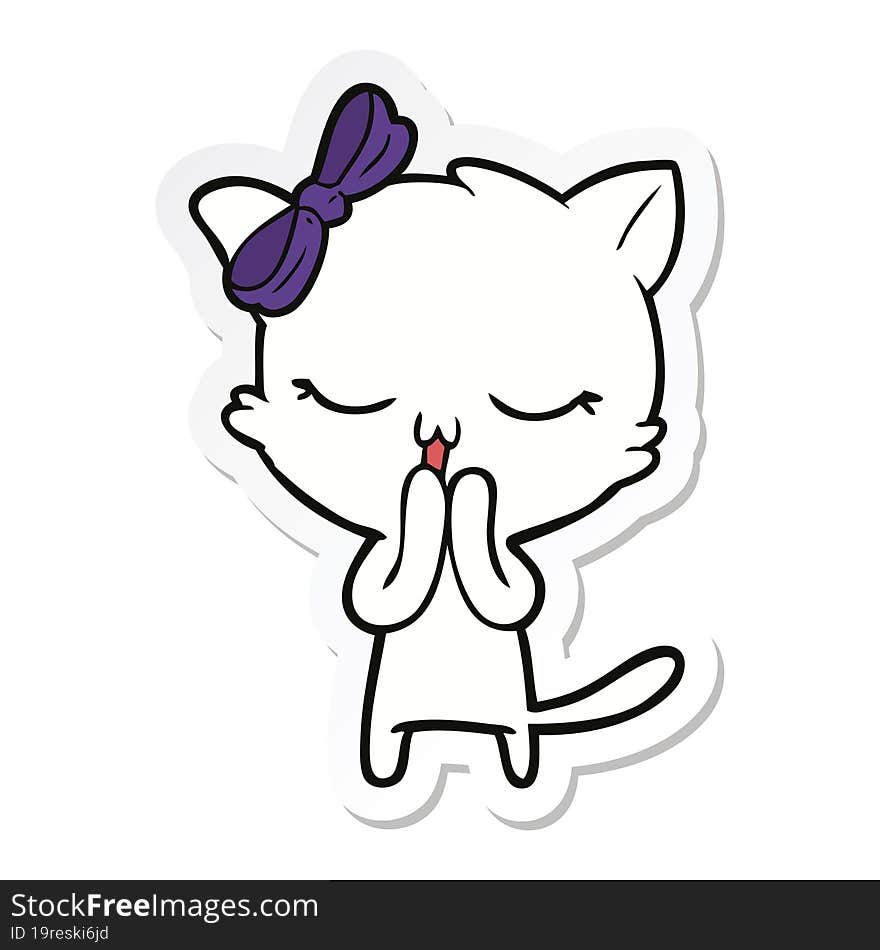 sticker of a cartoon cat with bow on head