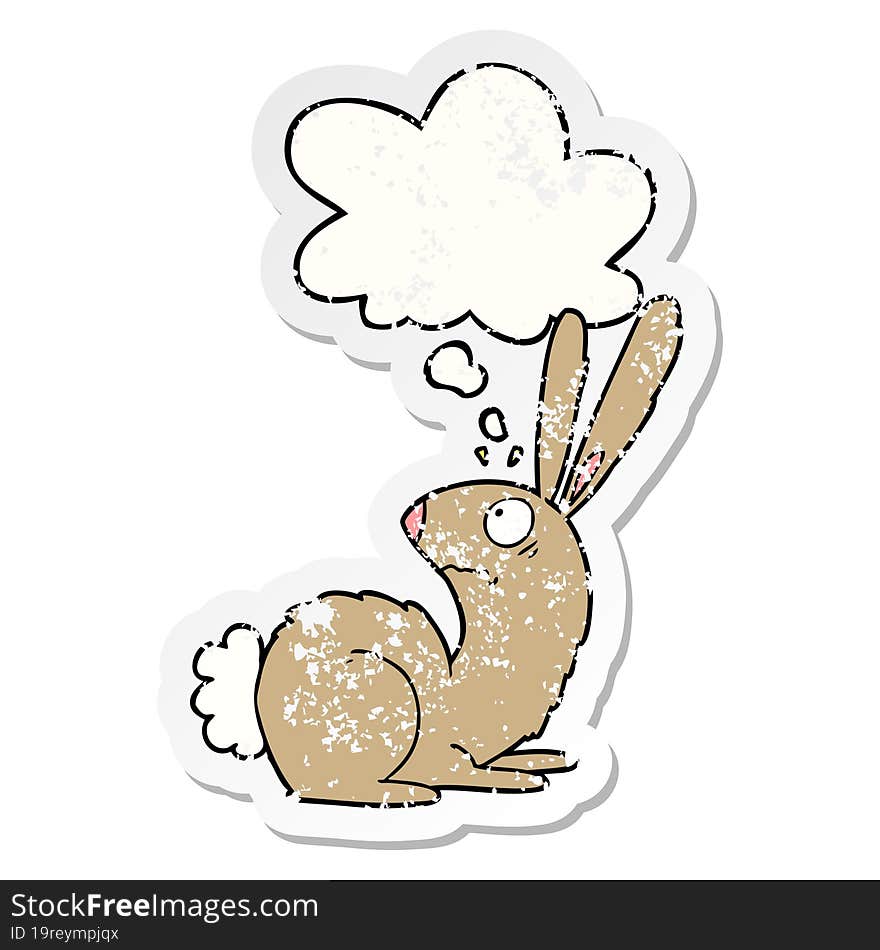 cartoon startled bunny rabbit and thought bubble as a distressed worn sticker