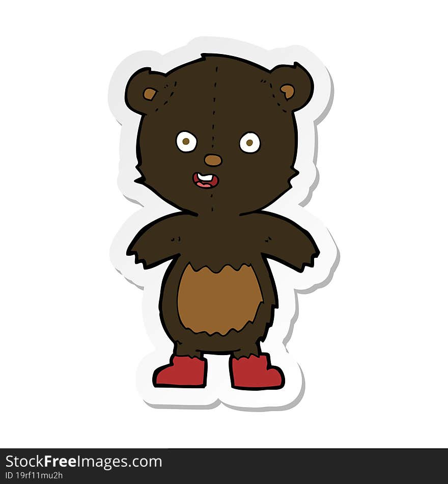 sticker of a cartoon happy teddy bear in boots