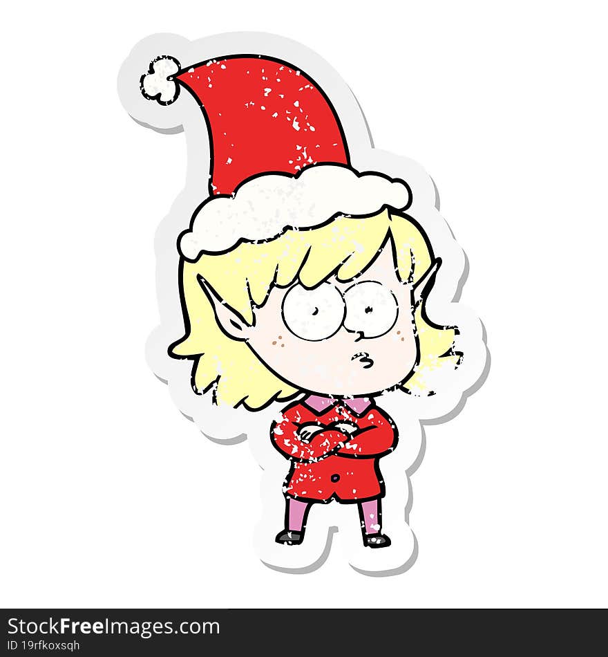 distressed sticker cartoon of a elf girl staring wearing santa hat