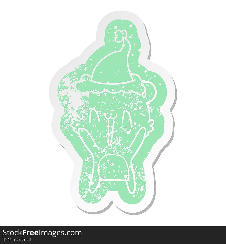 happy bear quirky cartoon distressed sticker of a wearing santa hat