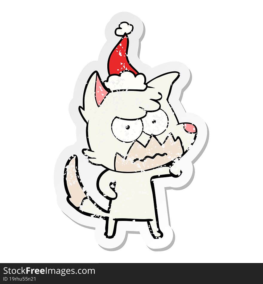 distressed sticker cartoon of a annoyed fox wearing santa hat