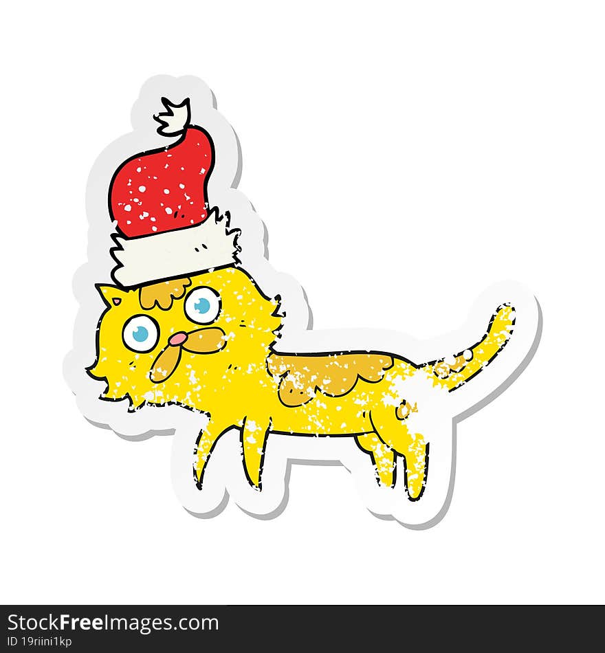 Retro Distressed Sticker Of A Cartoon Cat Wearing Christmas Hat