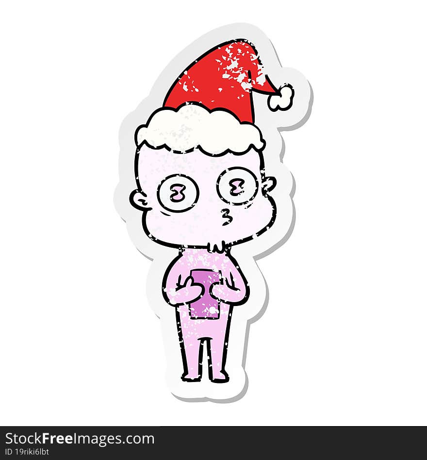 Distressed Sticker Cartoon Of A Weird Bald Spaceman Wearing Santa Hat