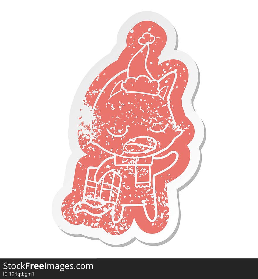 talking cat cartoon distressed sticker of a wearing santa hat