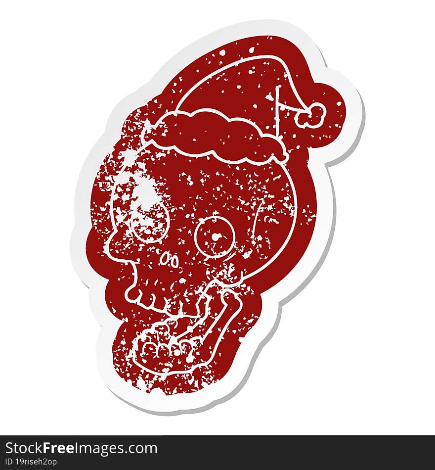 cartoon distressed sticker of a skull wearing santa hat