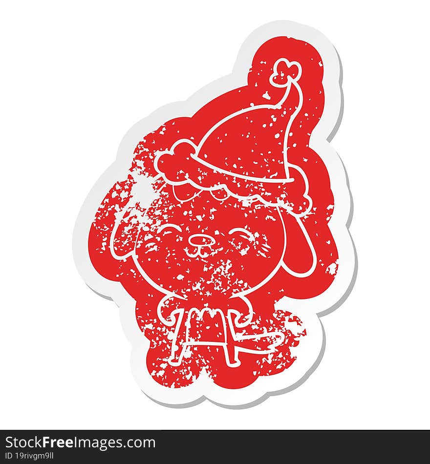 happy cartoon distressed sticker of a dog wearing santa hat