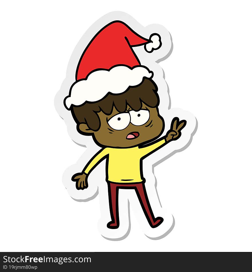 Sticker Cartoon Of A Exhausted Boy Wearing Santa Hat