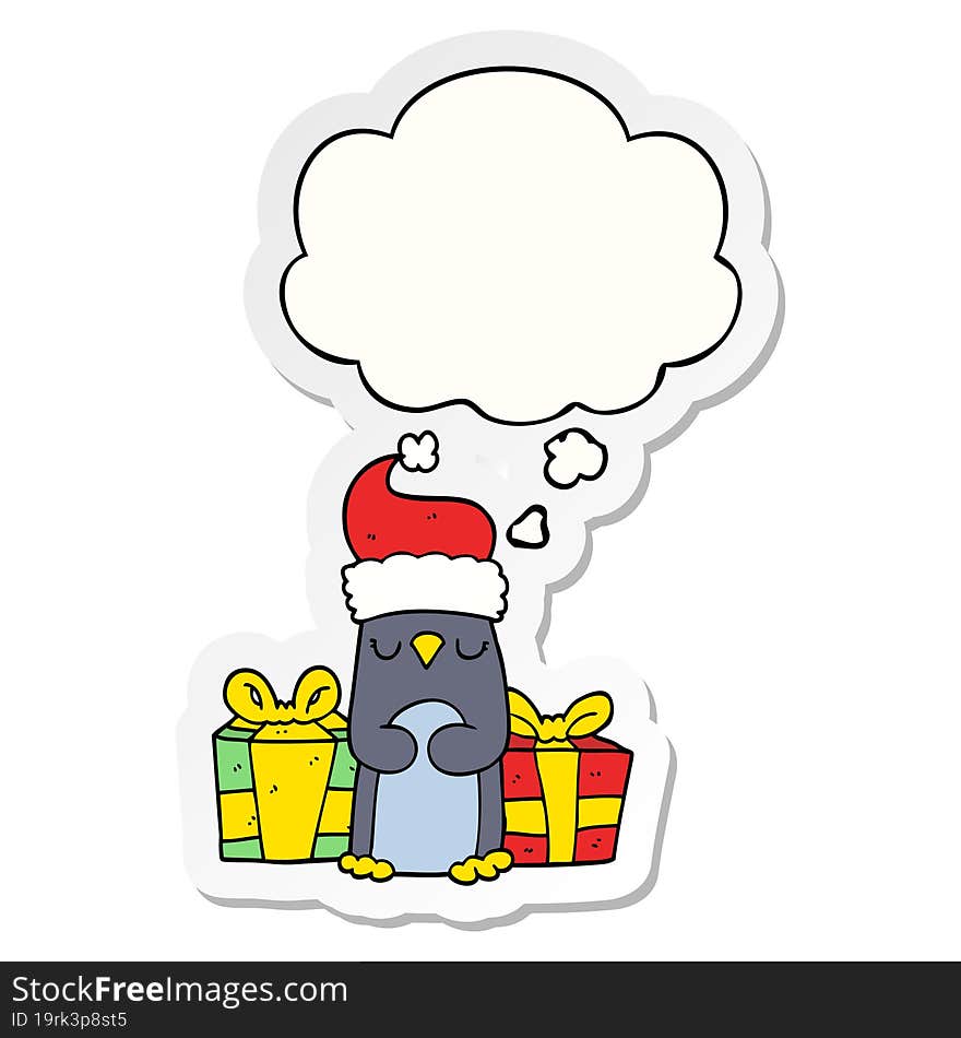 cute christmas penguin and thought bubble as a printed sticker