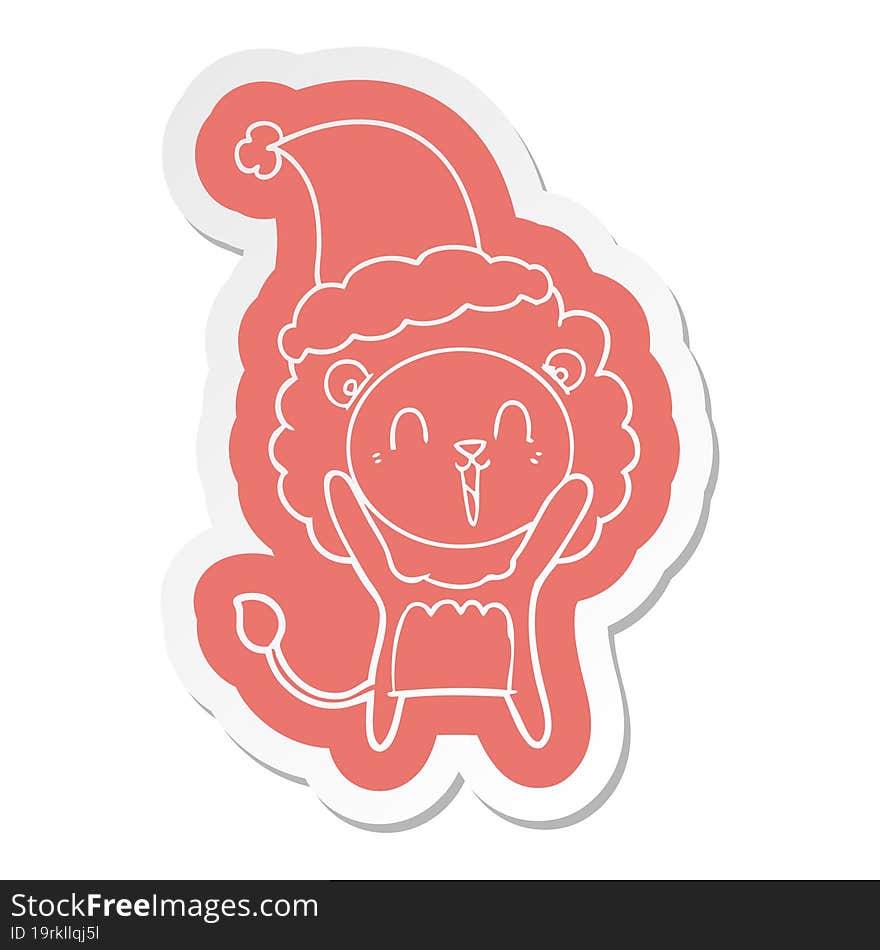 laughing lion cartoon  sticker of a wearing santa hat