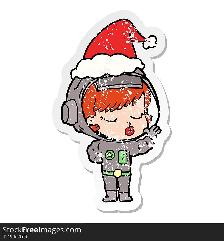 distressed sticker cartoon of a pretty astronaut girl wearing santa hat