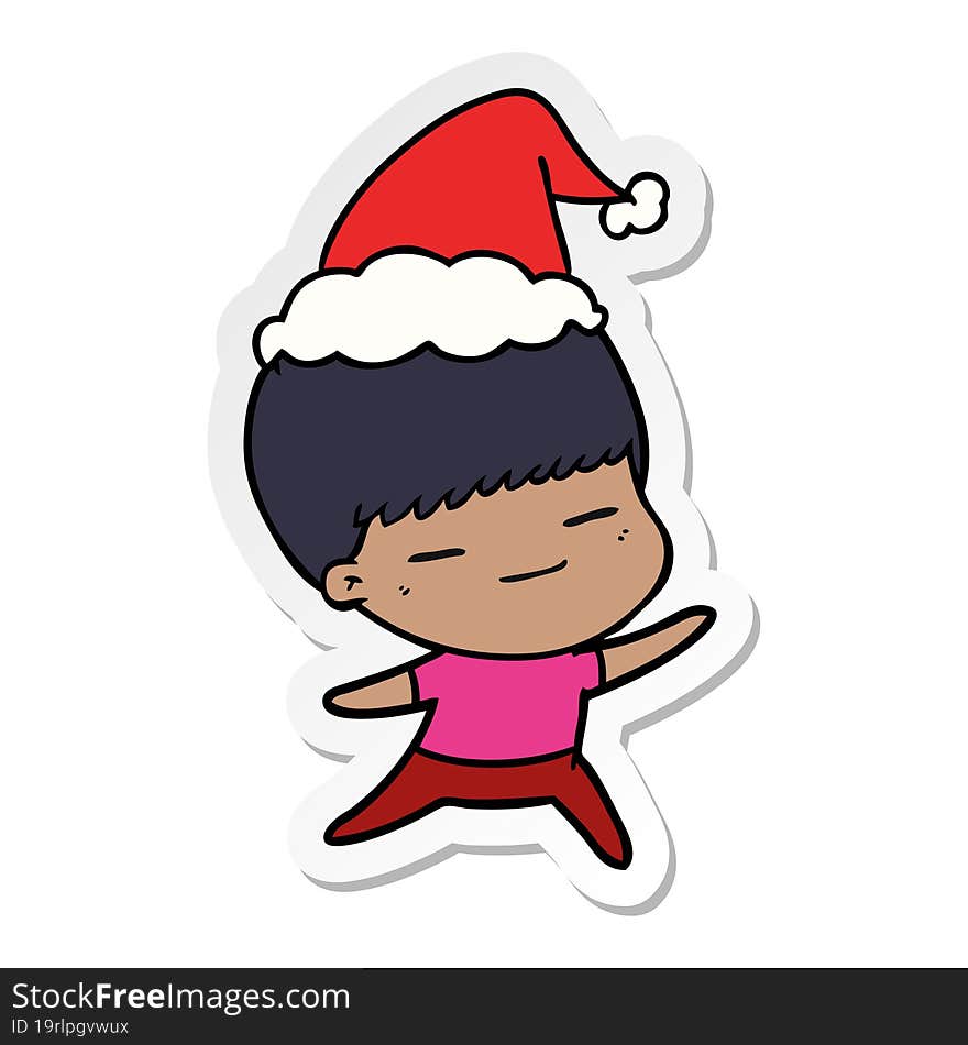 sticker cartoon of a smug boy wearing santa hat