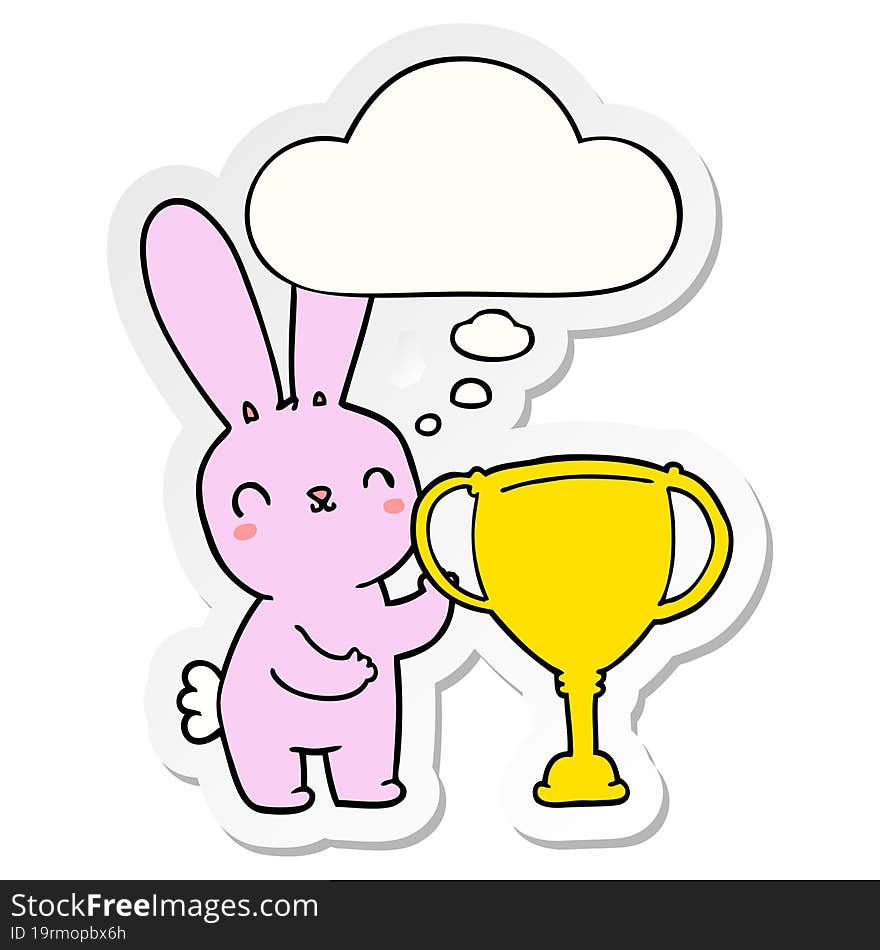 cute cartoon rabbit with sports trophy cup with thought bubble as a printed sticker