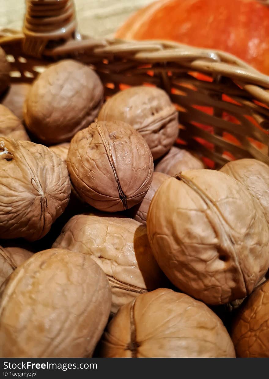 Walnuts in a basket in large quantities