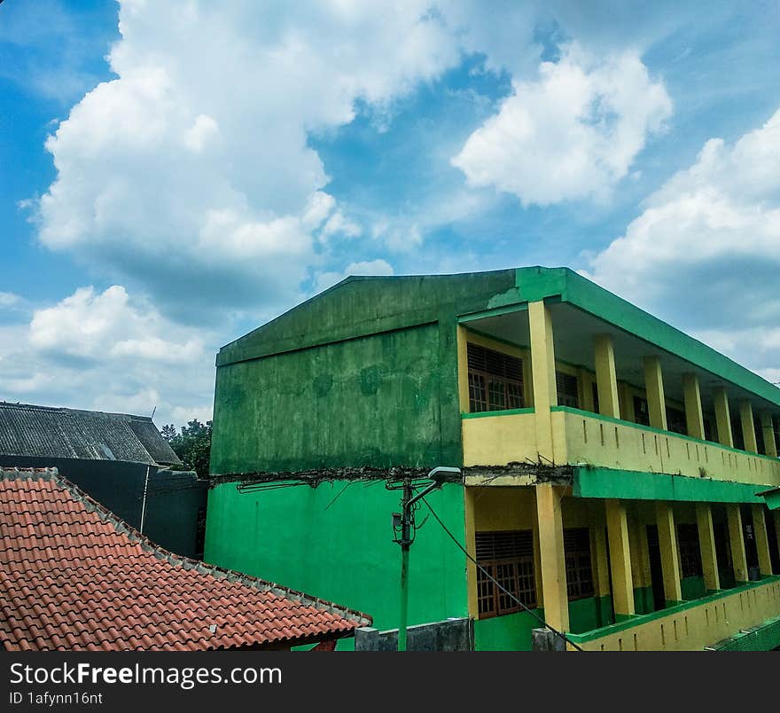 building city and green natural scenery with beautiful and cool clouds that are pleasing to the eye