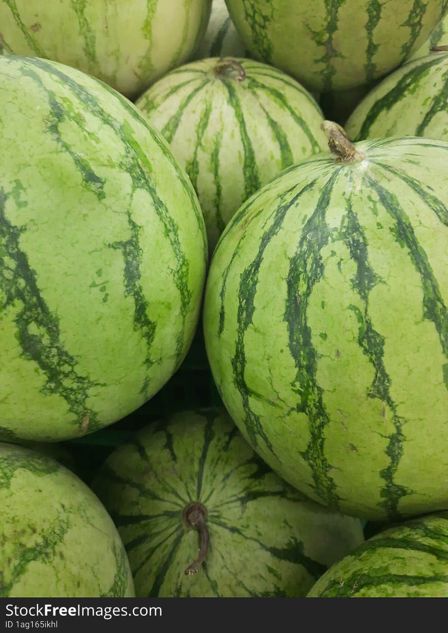 pile of green skin watermelons