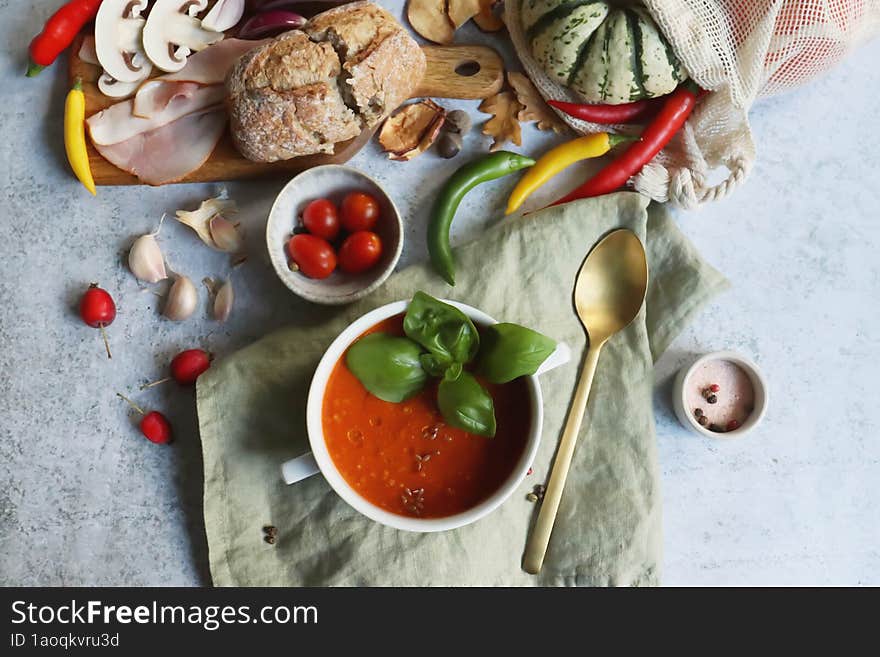 Hot Tomato Soup With Bread And Vegetables