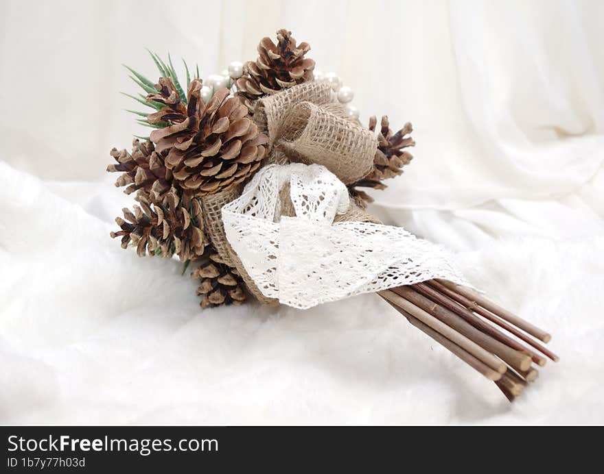 Wedding bouquet of cones. Winter bridal bouquet. Wedding accessory.