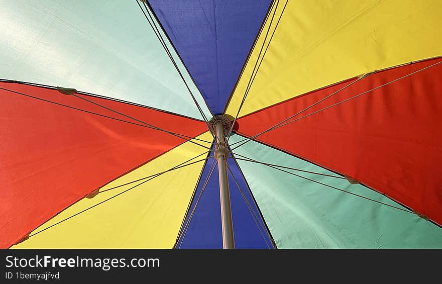 Colorful section of an umbrella on the street