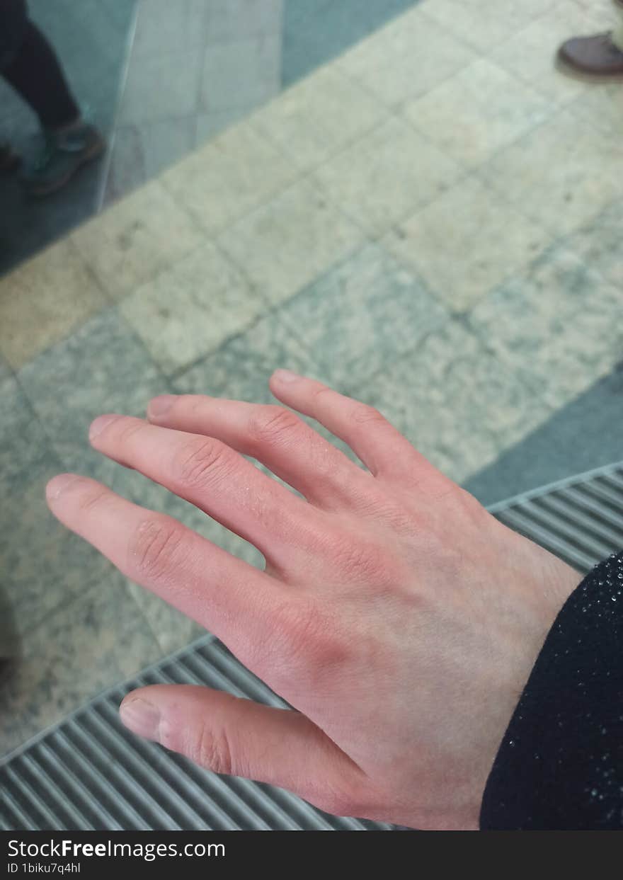 Cold hand in freezing temperatures during winter