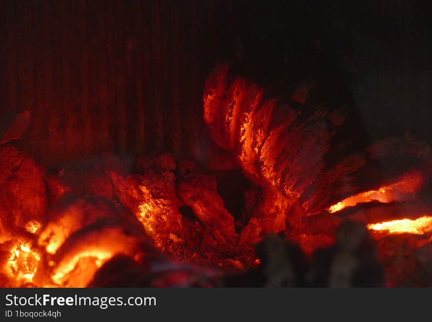 Embers Burning Wood In A Domestic Fireplace