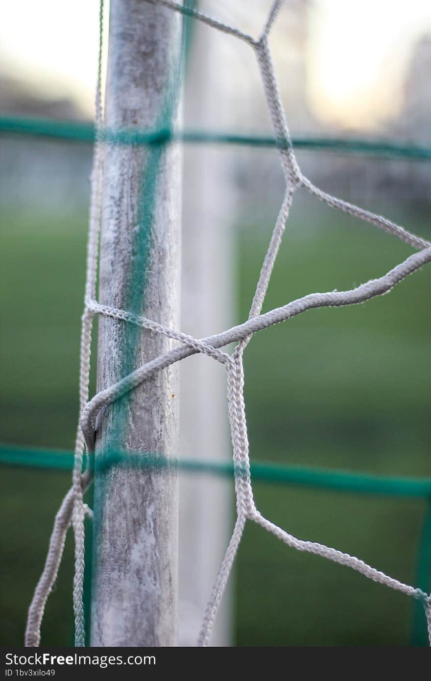 The net on the football goal. Children& x27 s football field.