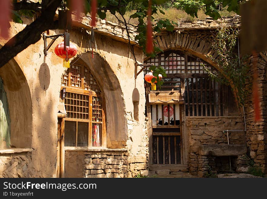 Background Picture Of Ancient Chinese Folk Caves In The Sun, Warm Color.