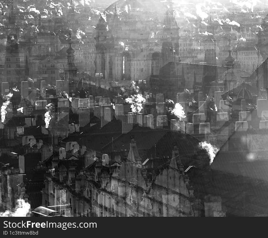 Prague Rooftops with smoking chimneys