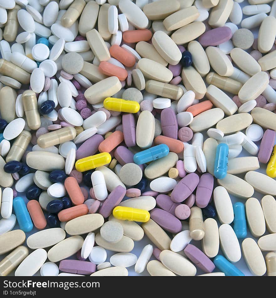 background with many colorful pills