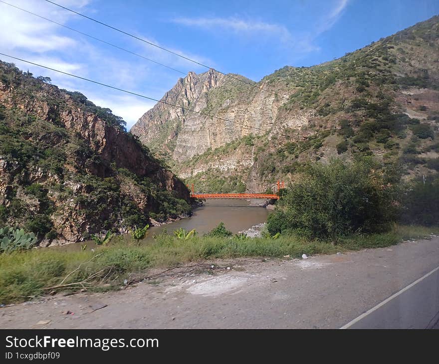 Bridge crossing the river in the Andes of Peru