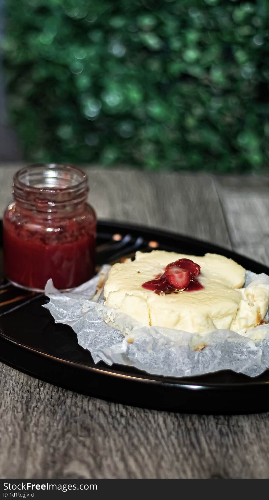 Snack of strawberry and san sebastian cheese cake