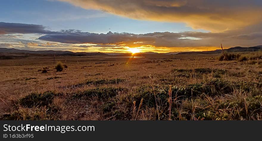 sunset over the mountains of the Peruvian Andes.