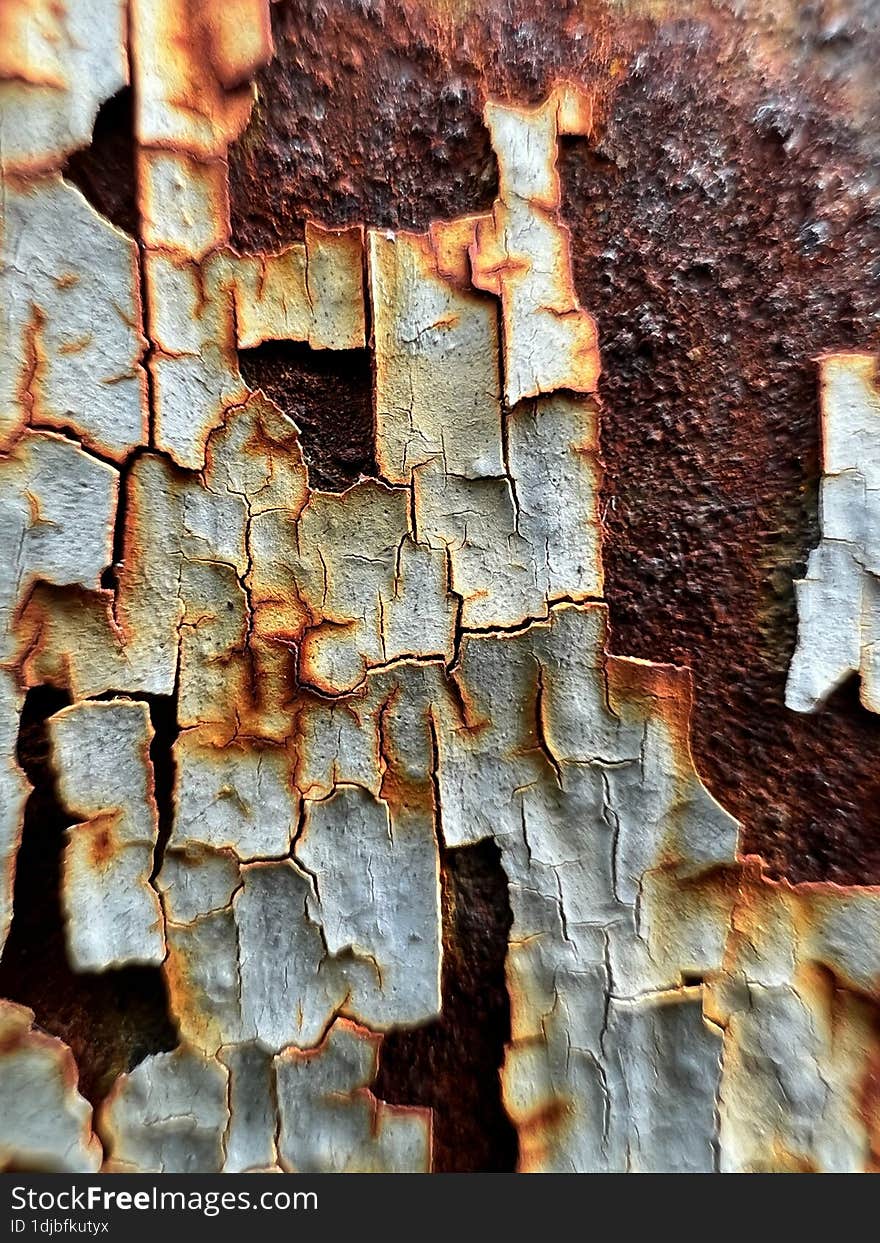 Rusty Metal With Peeling Paint. Old Pipe In Macro. Close-up Photo.