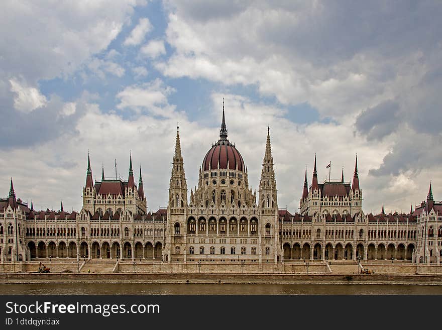 This magnificent building, built over 17 years & x28 1885�1902& x29  at the end of the 19th century, has become the symbol of Hungary and its capital by now. The period of its construction was characterised by a dynamic boom, almost unprecedented in Hungary& x27 s economy. This was the time when Heroes& x27  Square, Andr�ssy Avenue, Nyugati Railway Station and several bridges over the Danube were built and also when the continent�s first underground railway was opened. We could safely say that the largest domestic project of the period, however, was the construction of the House of Parliament, which in itself had a significant impact on the country�s economic development. The project was commissioned with the express intention to use Hungarian materials, involve Hungarian craftsmen and manufacturers, and use the flora of the Carpathian Basin as the inspiration for the decorative elements. Nothing was spared during the works, for example 40 kilograms of 22-23 carat gold were used for the building�s decorations. Chief architect and designer Imre Steindl, together with many artists and craftsmen of the era, created this unique work of art as a manifestation of the strength and self-belief of Hungarians.